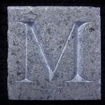 Sample letter 'M' cut in Portugese Antico Marble for Moet Hennessy .