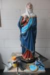 Restored and repainted plaster statue of Virgin Mary.Our lady of Compassion church .Upton park.In the workshop prior to intallation.